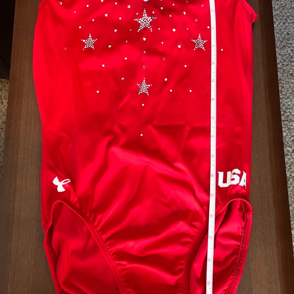 Red gym suit.